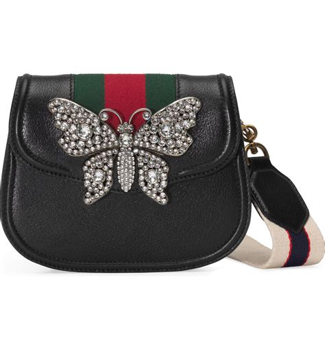 gucci handbag with butterfly.